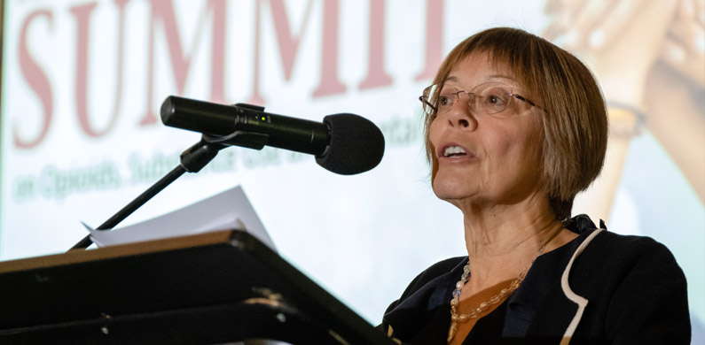 Joanne Bezzubetz speaking at Opioid Summit
