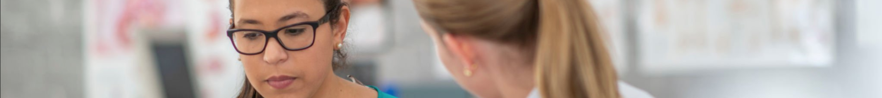 Nurse speaking with patient