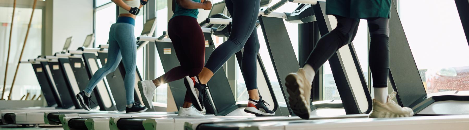 People running on a treadmill.