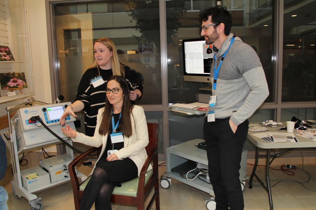 Researchers from the rTMS clinic demonstrate at Research Week 2024 