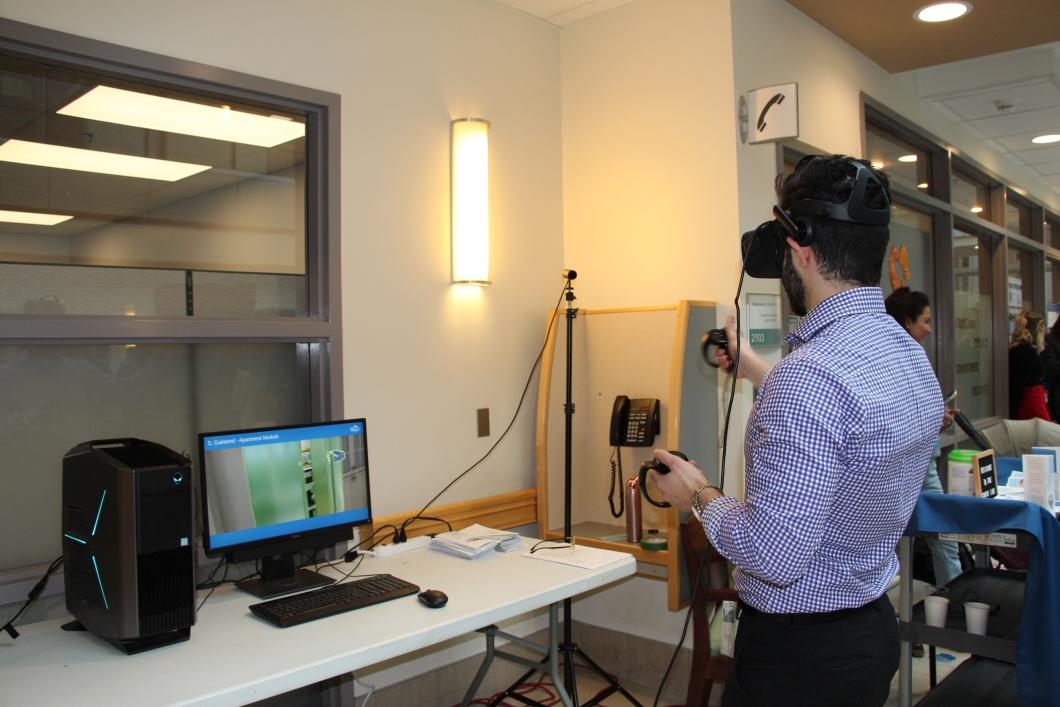 Researcher demonstrates virtual reality application during Research Week 2024